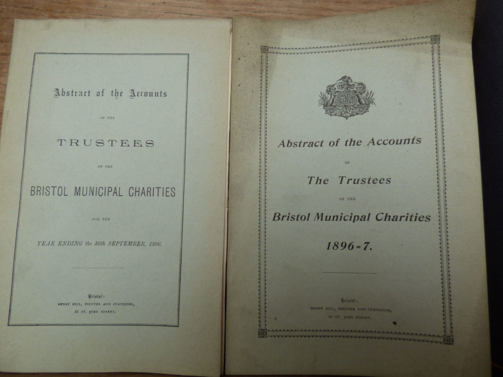 Image shows book of accounts with yellowing pages