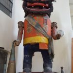 giant wooden toy soldier with long nose