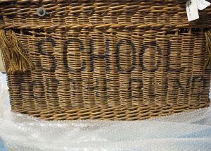 Large rectangular laundry basket with hinged lid and rope handles with ‘School for the Blind’ stencilled on the front. In the collection of the Museum of Liverpool MMM.1994.108.1, image taken by Anna Fairley Nielsson.