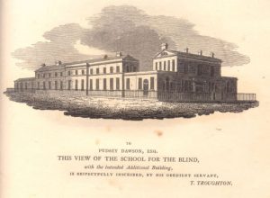 Drawing of the extension of the school for the blind surrounded by railings. The building forms a long L shape with around thirty windows.
