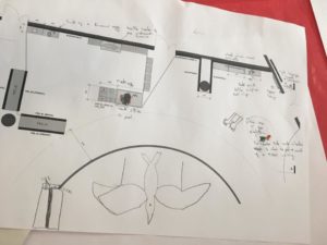 The image shows a floor plan of a museum space and the young person has sketched over and written in ideas for an accessible disosaur exhibition.